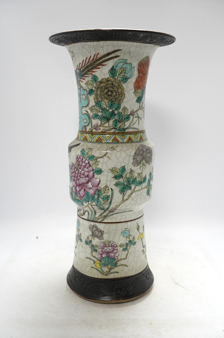 A large Chinese famille rose crackle gu vase, early 20th century, 44.5cm high. Condition - has hole to base where possibly used as a lamp, rest of lamp good